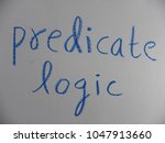 Small photo of Text predicate logic hand written by blue oil pastel on white color paper