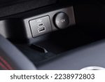 Power outlet and USB port in car