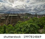Small photo of The misalliance over Edinburgh. Edinburgh, Scotland - July 27, 2017 A remarkable combination of cloudy skies and sunlight over Edinburgh.