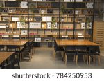 Small photo of ADIR, ISRAEL - NOVEMBER 11, 2017: Interior design of a room with large tables, chairs and shelves