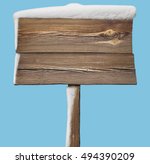 Wooden sign with snow isolated...