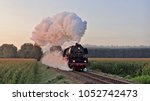 An Old Steam Train With A Nice...