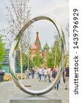 Small photo of MOSCOW, RUSSIA - May 30, 2019: People walking near The sculpture "Infinite curve" that personifies the infinity of time and space in Zaryadye Park