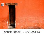 Orange Facade Of A House With A ...