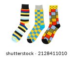 Small photo of Three sock with different lines isolated on white background. Colorful sock son white background. Colored socks on the leg isolated on white background