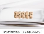 Small photo of Word infix made by wooden cubes