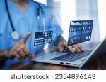 Small photo of Doctor using computer backup data on Cloud Computer technology and storage online for computer, computer backup storage data Internet technology backup online document, backup data concept