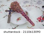 Small photo of basil and cross used by priests to sanctify houses with aghiasma and objects in Romania, Bistrita 2022