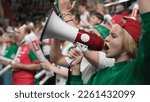 Small photo of Crazy fan win goal bet. Happy mad woman scream megaphone bullhorn. Smile girl sport game cup. Joy female shout loudspeaker close up. Wild loud megaphone yell. Bully view hard play. Enjoy entertainment