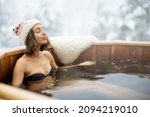 Woman relaxing in hot bath...