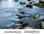 Rocks In Stream With Smooth...