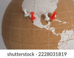 Small photo of Cork world ball showing Mexico with colored thumbtacks with part of the USA and the northern part of South America · Plan destinations · Places visited · Next destination