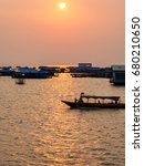 Sunset On The Tonle Sap Lake ...