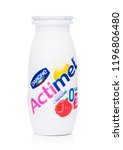 Small photo of LONDON, UK - OCTOBER 05, 2018: Plastic bottle of Actimel probiotic yogurt type drink with raspberry flavour. Produced by the French company Danone