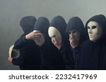 Small photo of surreal duplicate man with mask, concept of identity crisis with various personalities