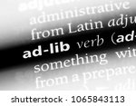 Small photo of ad-lib word in a dictionary. ad-lib concept.