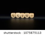 Nsfw word on wooden cubes. Nsfw concept