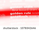 Small photo of golden rule word in a dictionary. golden rule concept