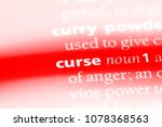 Small photo of curse word in a dictionary. curse concept
