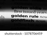 Small photo of golden rule word in a dictionary. golden rule concept