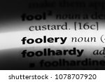 Small photo of foolery word in a dictionary. foolery concept