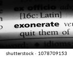 Small photo of exonerate word in a dictionary. exonerate concept