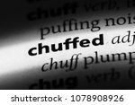 Small photo of chuffed word in a dictionary. chuffed concept