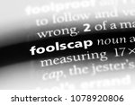 Small photo of foolscap word in a dictionary. foolscap concept