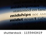 Small photo of midships word in a dictionary. midships concept.