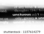 Small photo of unctuous word in a dictionary. unctuous concept.