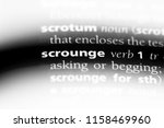Small photo of scrounge word in a dictionary. scrounge concept.