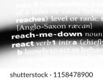 Small photo of reach me down word in a dictionary. reach me down concept.