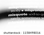 Small photo of misquote word in a dictionary. misquote concept.