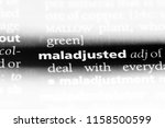 Small photo of maladjusted word in a dictionary. maladjusted concept.