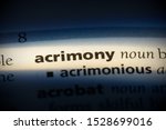 Small photo of acrimony word in a dictionary. acrimony concept, definition.
