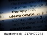 Small photo of electrocute word in a dictionary. electrocute concept, definition.