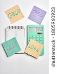 Small photo of calculater ,pen and blank notebook for office on white background isolated. money signs