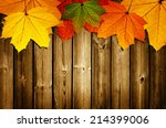 Wooden background with autumn...