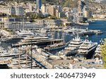 Small photo of Monaco, Monte Carlo, 28 September 2022 - Top view of the famous yacht show, exhibition of luxury mega yachts, the most expensive boats for the richest people around the world, yacht brokers