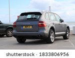 Small photo of 9th October 2020- Porsche Cayenne S Tiptronic, five door suv, parked in Pendine, Carmarthenshire, Wales, UK.