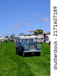 Small photo of 29th May 2022- A 1979 Land Rover 88"-4 Cyl station wagon with a safari roof being driven at a classic car show near Newcastle Emlyn, Ceredigion, Wales, UK.