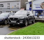 Small photo of 20th February 2024- A stylish MG HS Exclusive, five door SUV, parked in the town center at Carmarthen, Carmarthenshire, Wales, UK.
