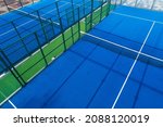 Small photo of Aerial view with drone, overhead shot of a paddle tennis courts. Racket sports concept