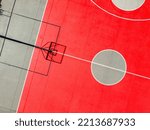 Small photo of aerial view of a basketball court in autumn