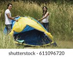 Young Couple Camping In High...