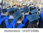 Small photo of Students gather together at graduation ceremony
