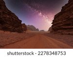 Majestic view of the Wadi Rum desert, Jordan, The Valley of the Moon. Orange sand, Milky Way sky.
Sunset wallpaper. World landmarks. Discover beauty of the earth. National park outdoors landscape. 