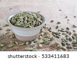 roasted pumpkin kernels in a... | Shutterstock . vector #533411683