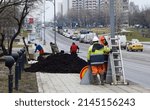 Small photo of moscow, russia april 12, 2022 workers ennoble the area