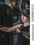 Small photo of Gym.Fitness woman working out in the gym, doing exercises for health and beautiful figure.fitness in gym,fitness girl,fitness,fitness,mental health,active lifestyle,self-care,health,wellness,fitness